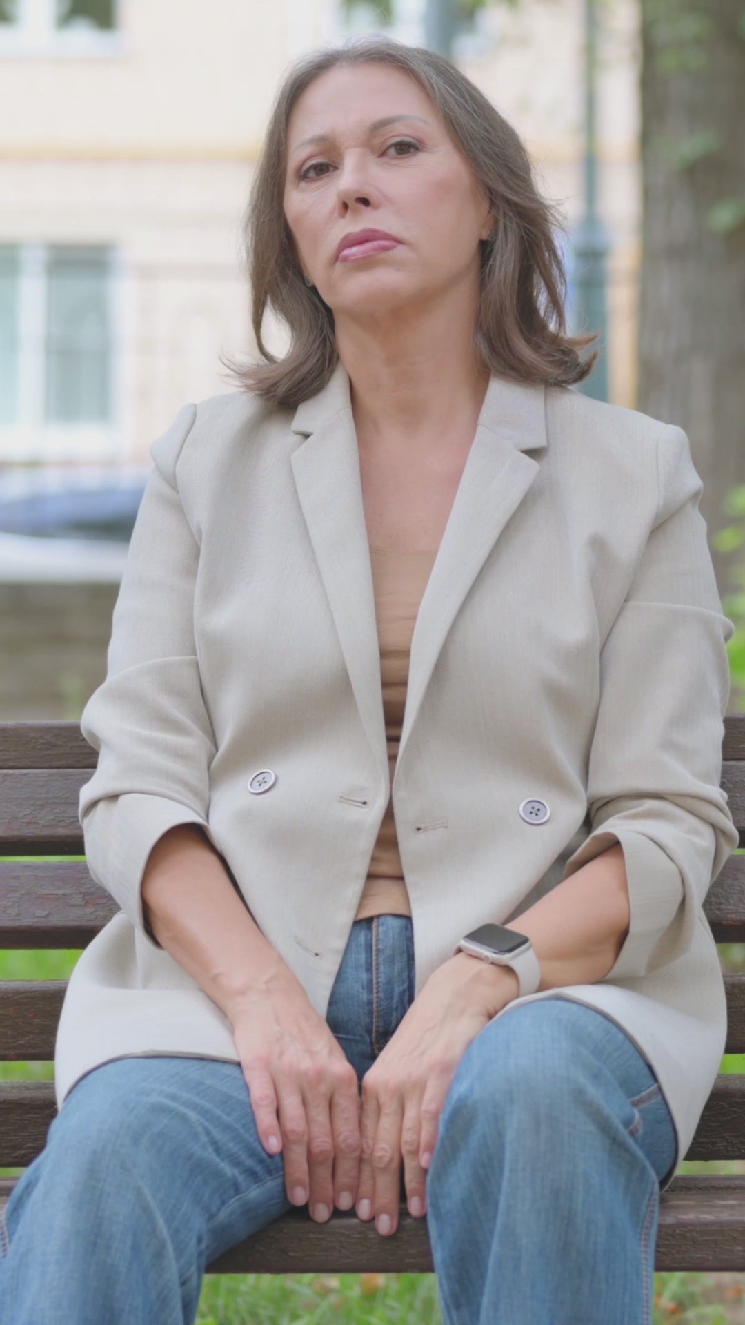 old-senior-woman-with-spinal-pain-sitting-in-park-2025-10-20-18-49-51-utc.mp4